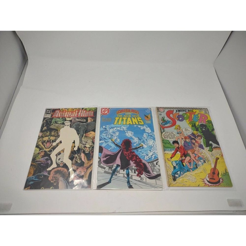 DC Comics Vintage Lot Copper Silver Age Animal Man New Teen Titans Swing Scooter